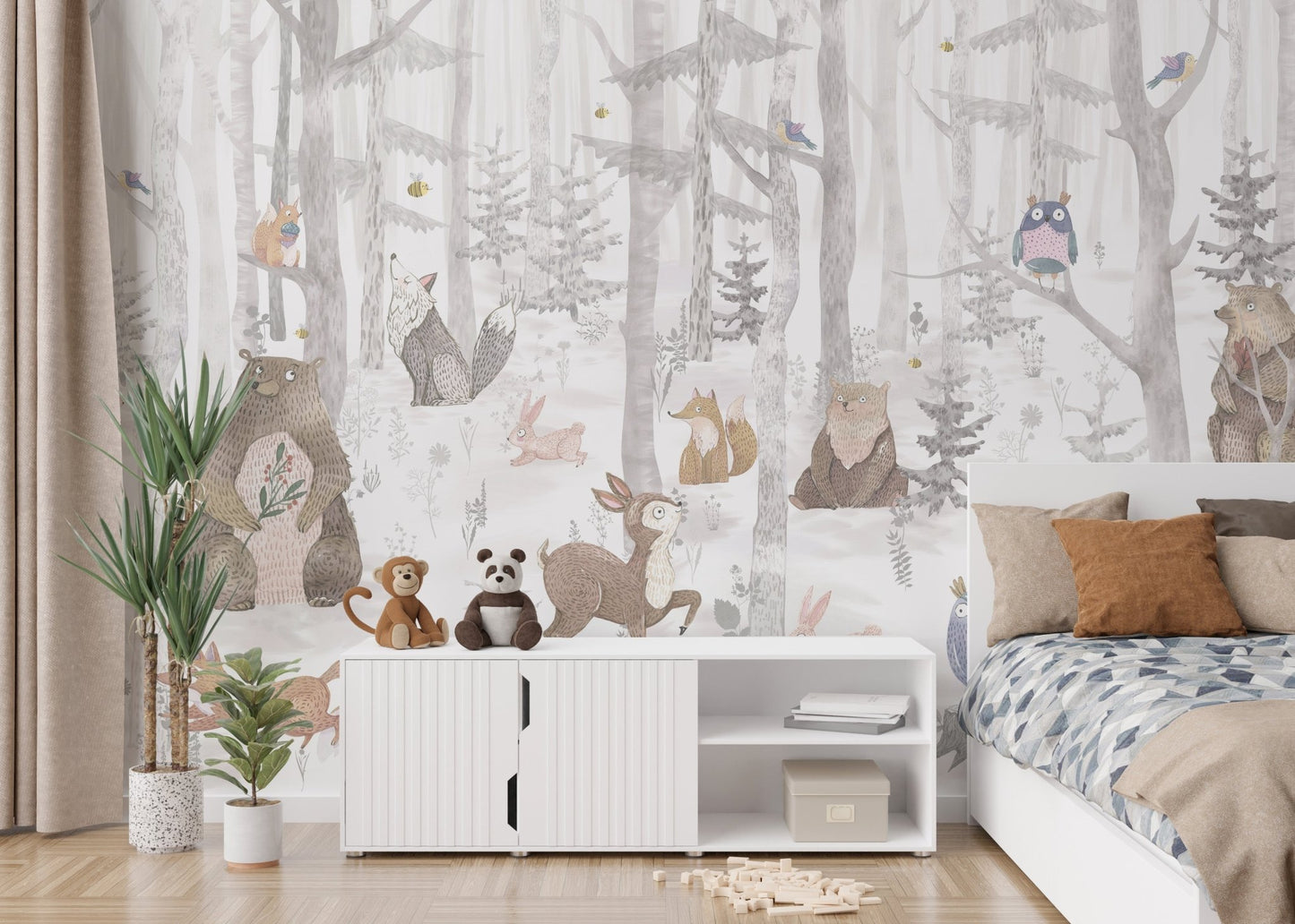 Whimsical watercolor animal wall mural with white storage in bedroom.