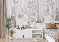 Whimsical watercolor animal wall mural with white storage in bedroom.
