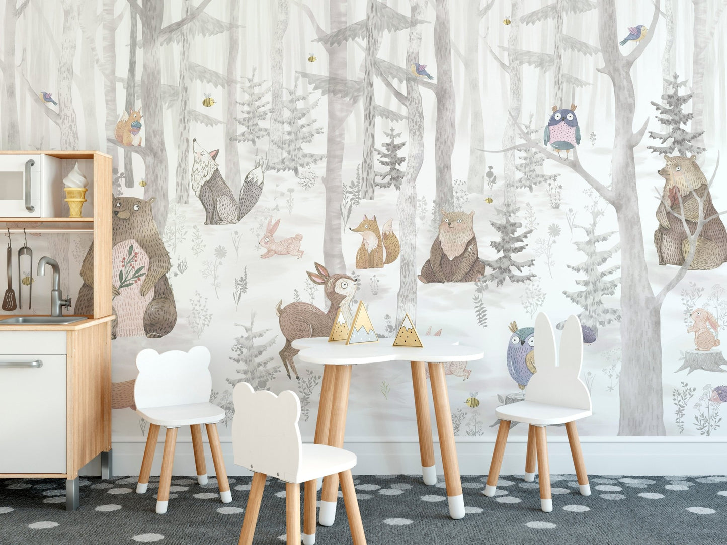 Kids dining area showing watercolor animal mural with wooden furniture.