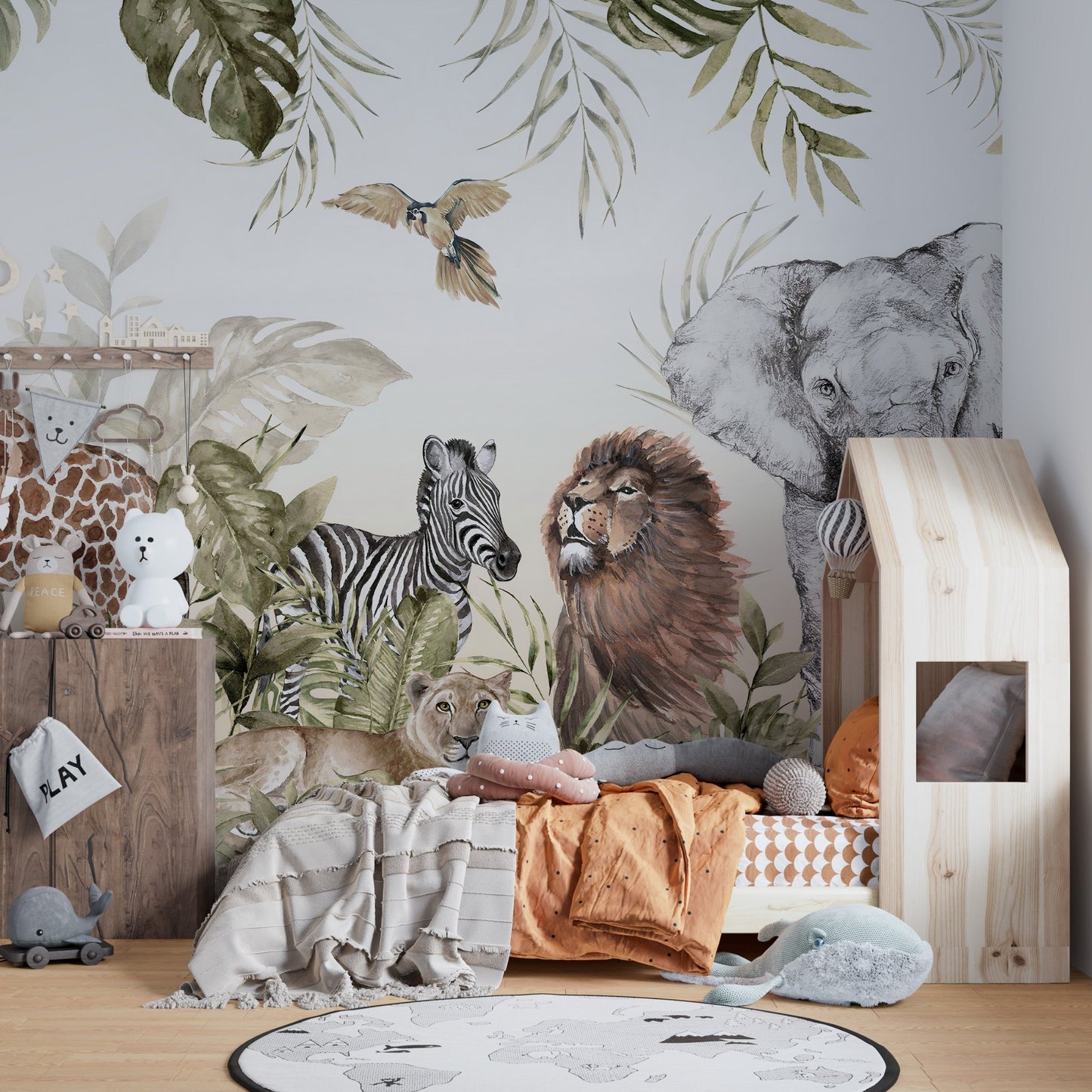 Neutral toned jungle animal wall mural behind a wooden toddler bed.
