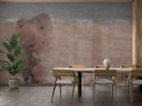 Modern dining area with large watercolor beige wall mural and chairs.