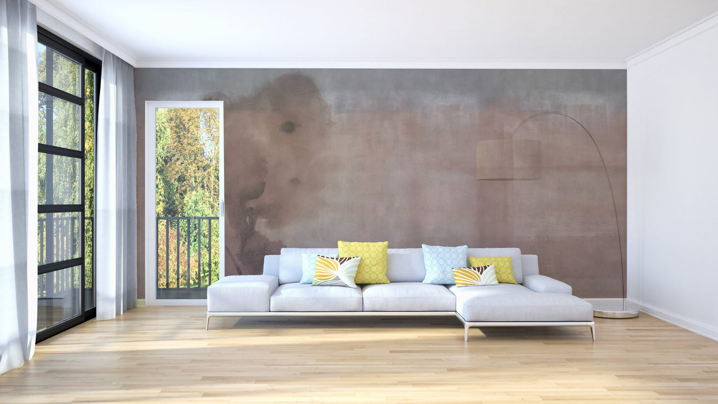 Large living room with light beige watercolor wall mural behind a white sofa.