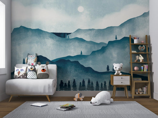 Watercolor mountain forest wallpaper with misty teal peaks and a soft sun.