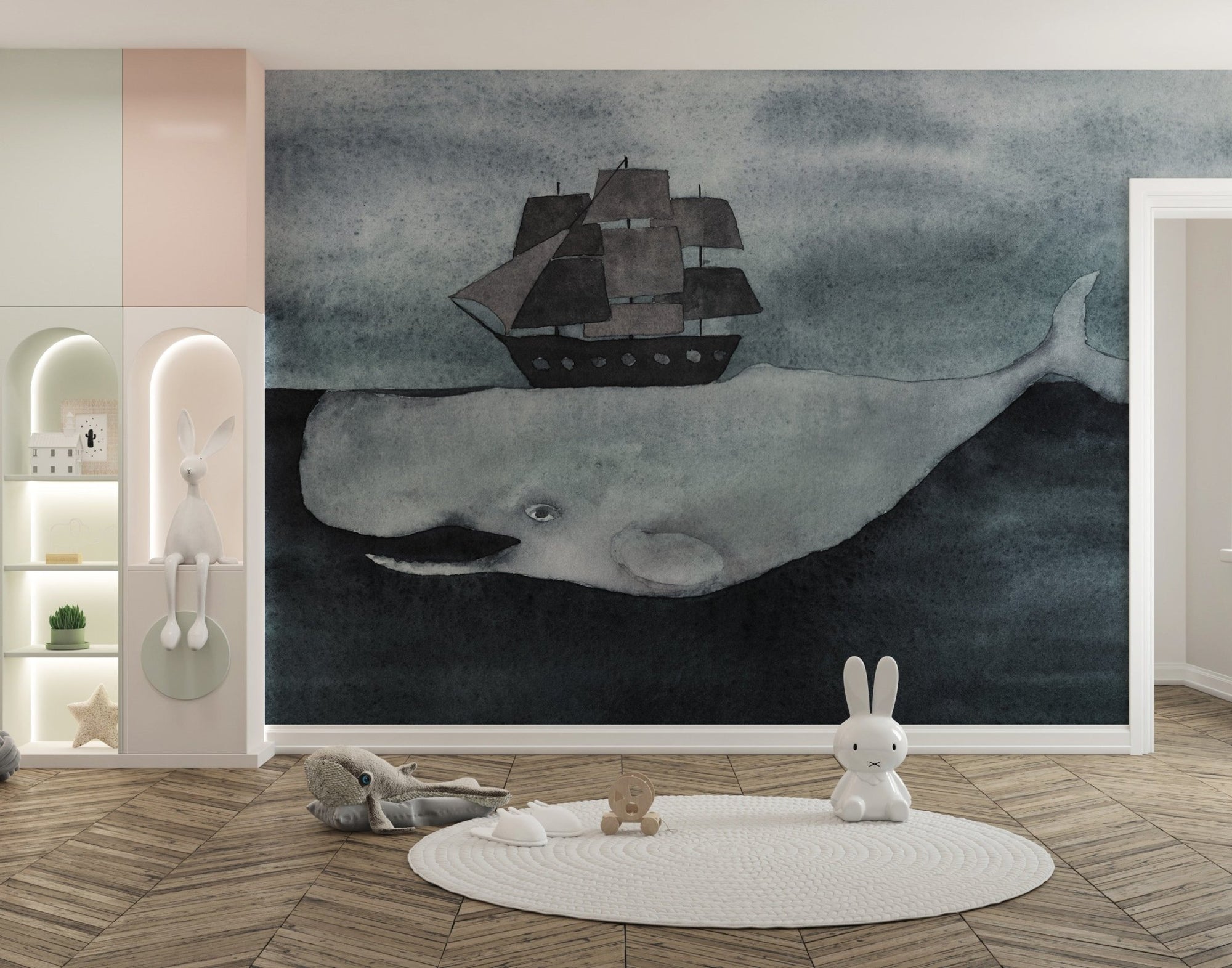 Watercolor ocean whale wall mural with a grey pirate ship in a kids play area.