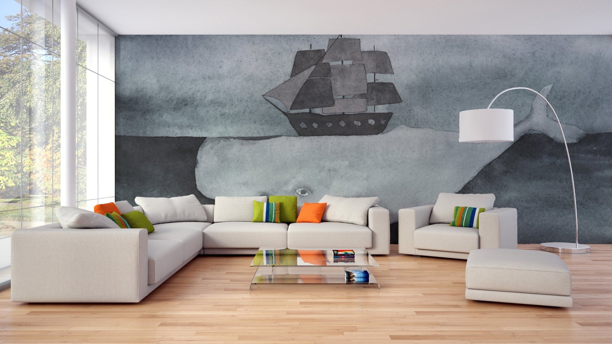 Large grey whale and wooden ship wall mural behind a white sectional sofa.