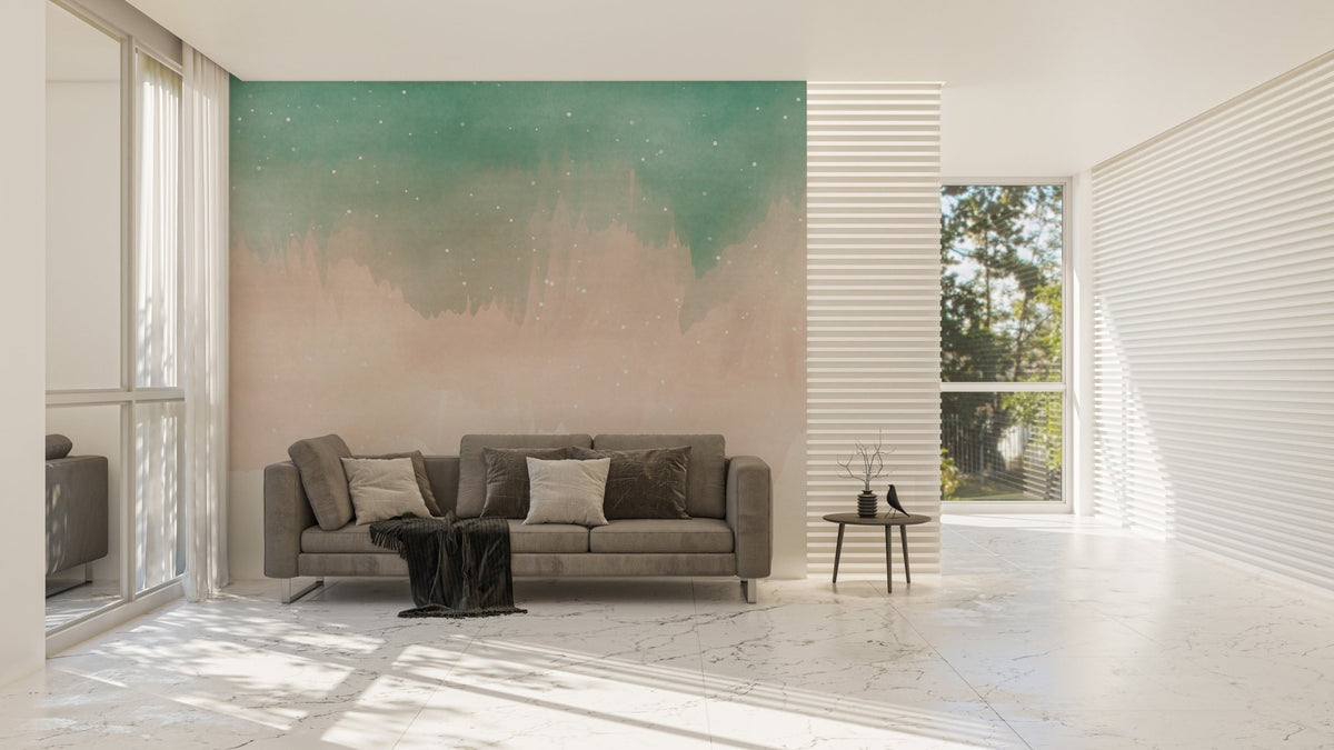 Minimalist living area with green and tan ombre wall mural and natural light.