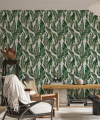 Living room with green palm leaves wallpaper mural decor.