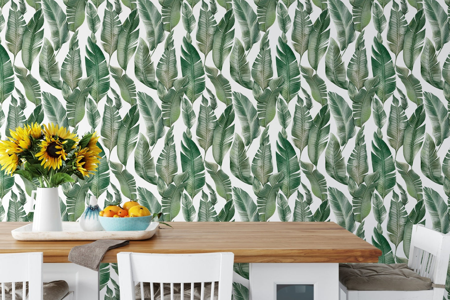 Watercolor Palm Green Leaves wallpaper in a dining room setting.