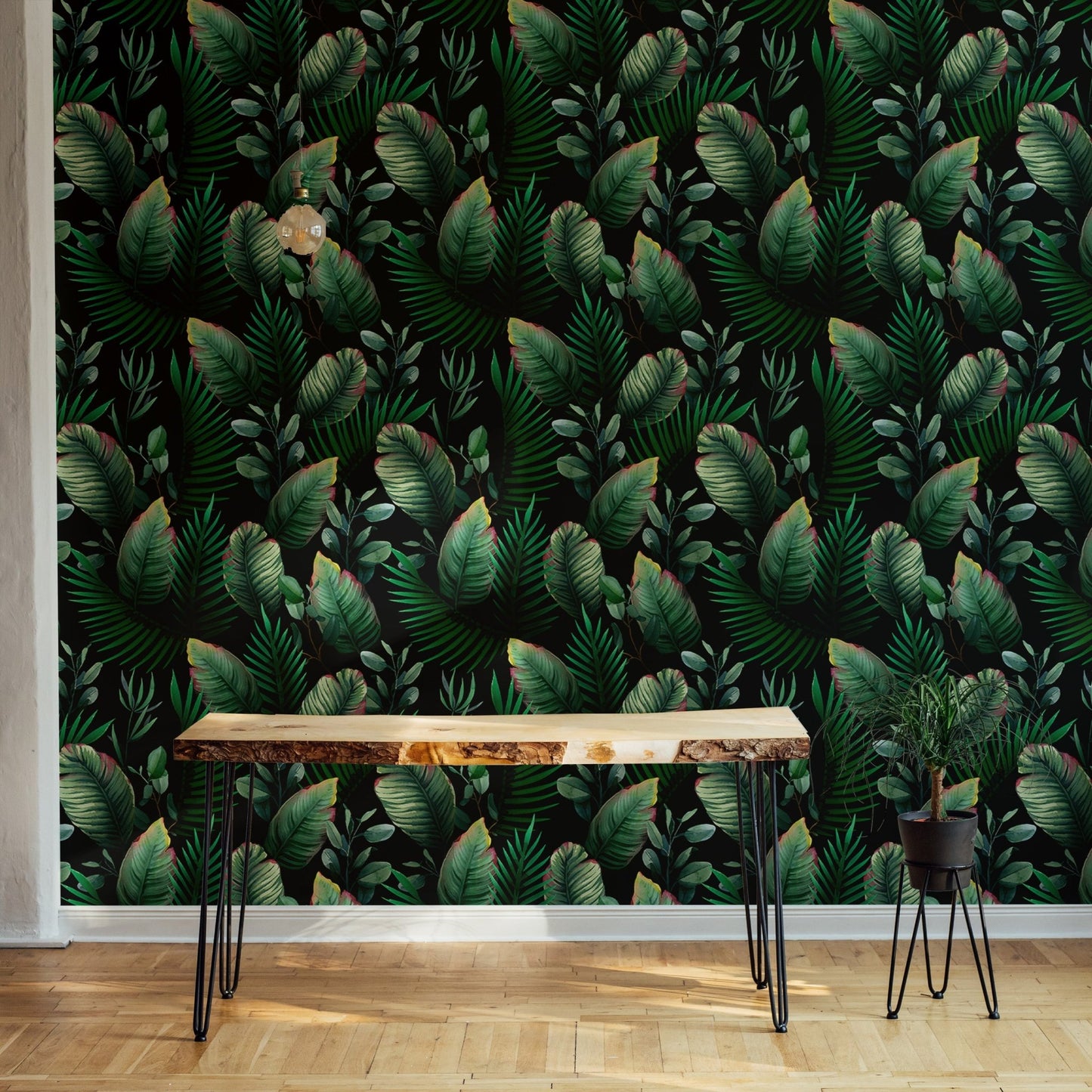 Tropical leaf green wallpaper accentuating a minimalist room decor.
