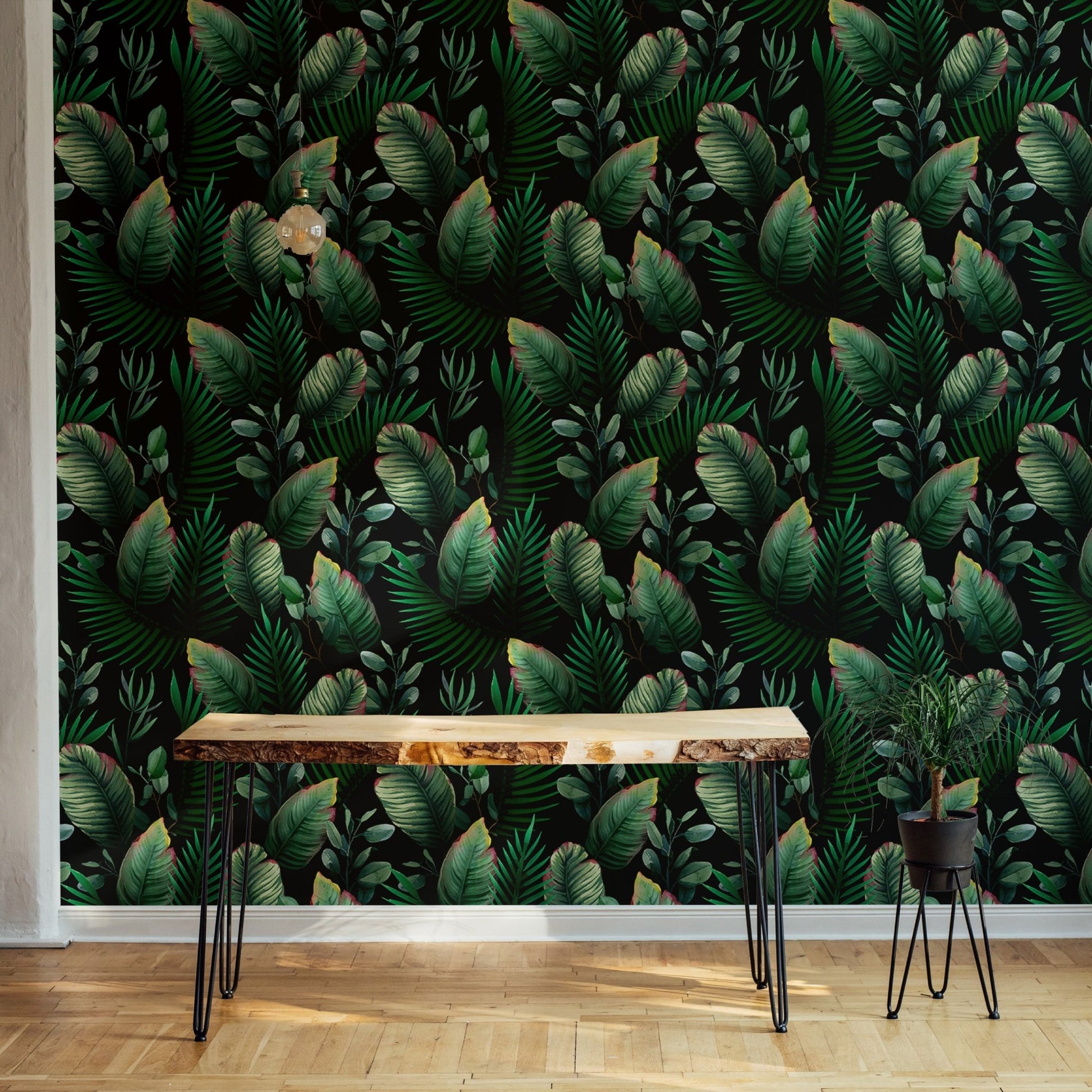 Tropical leaf green wallpaper accentuating a minimalist room decor.