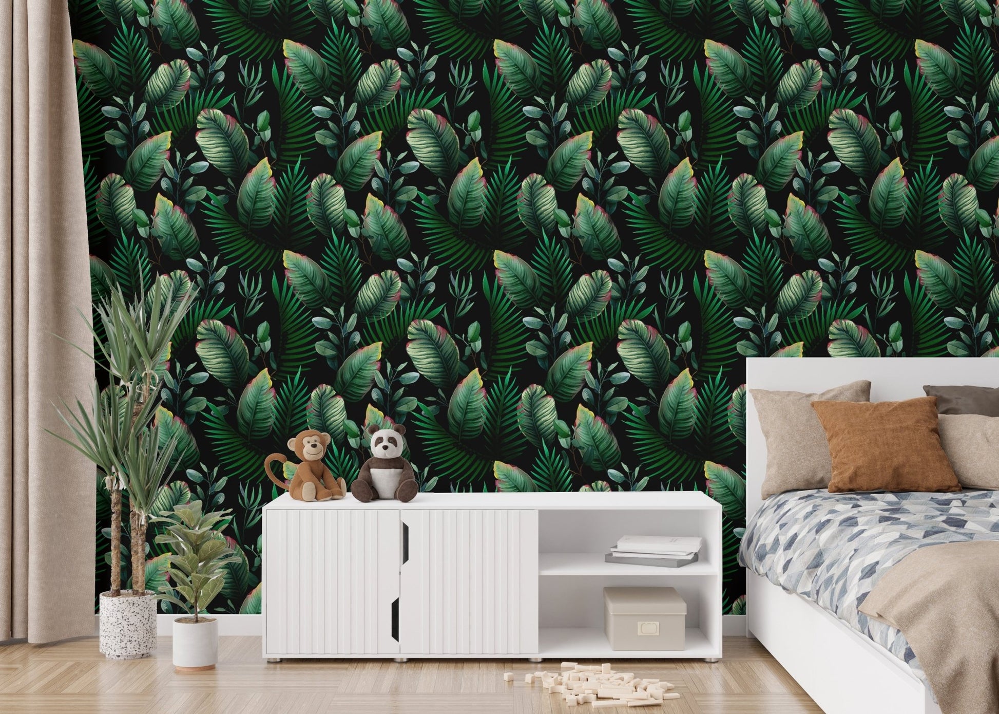 Bedroom wall styled with dark tropical Watercolor Green Wallpaper.