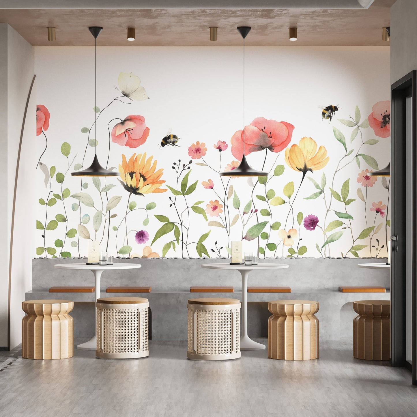 Petal parade wall mural with gentle watercolor flower tones in cafe area.