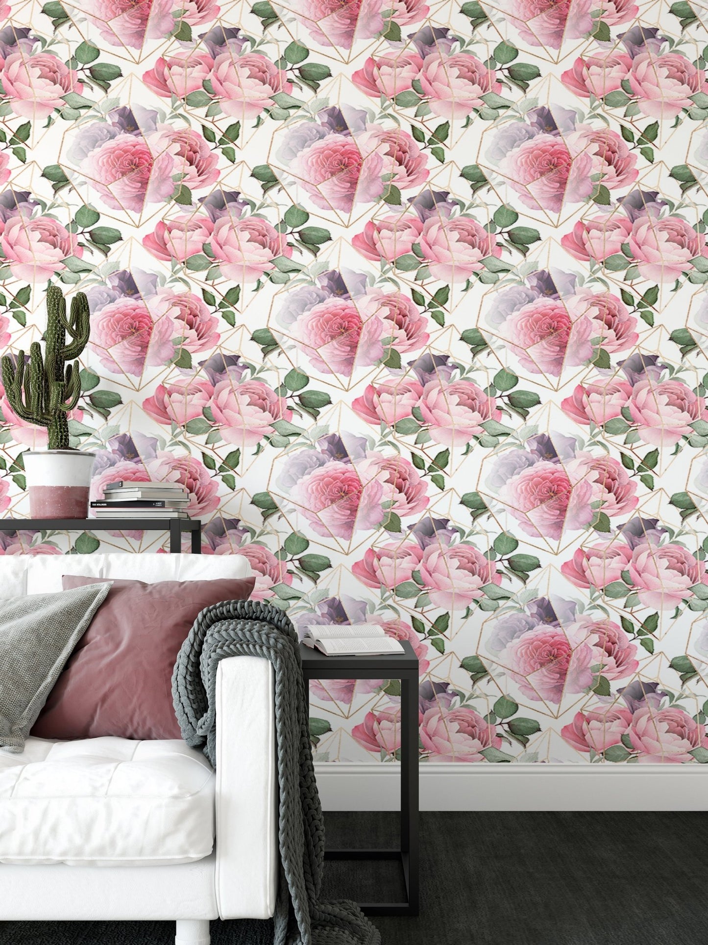 Modern living room wallpaper with pink flowers and a white sofa.