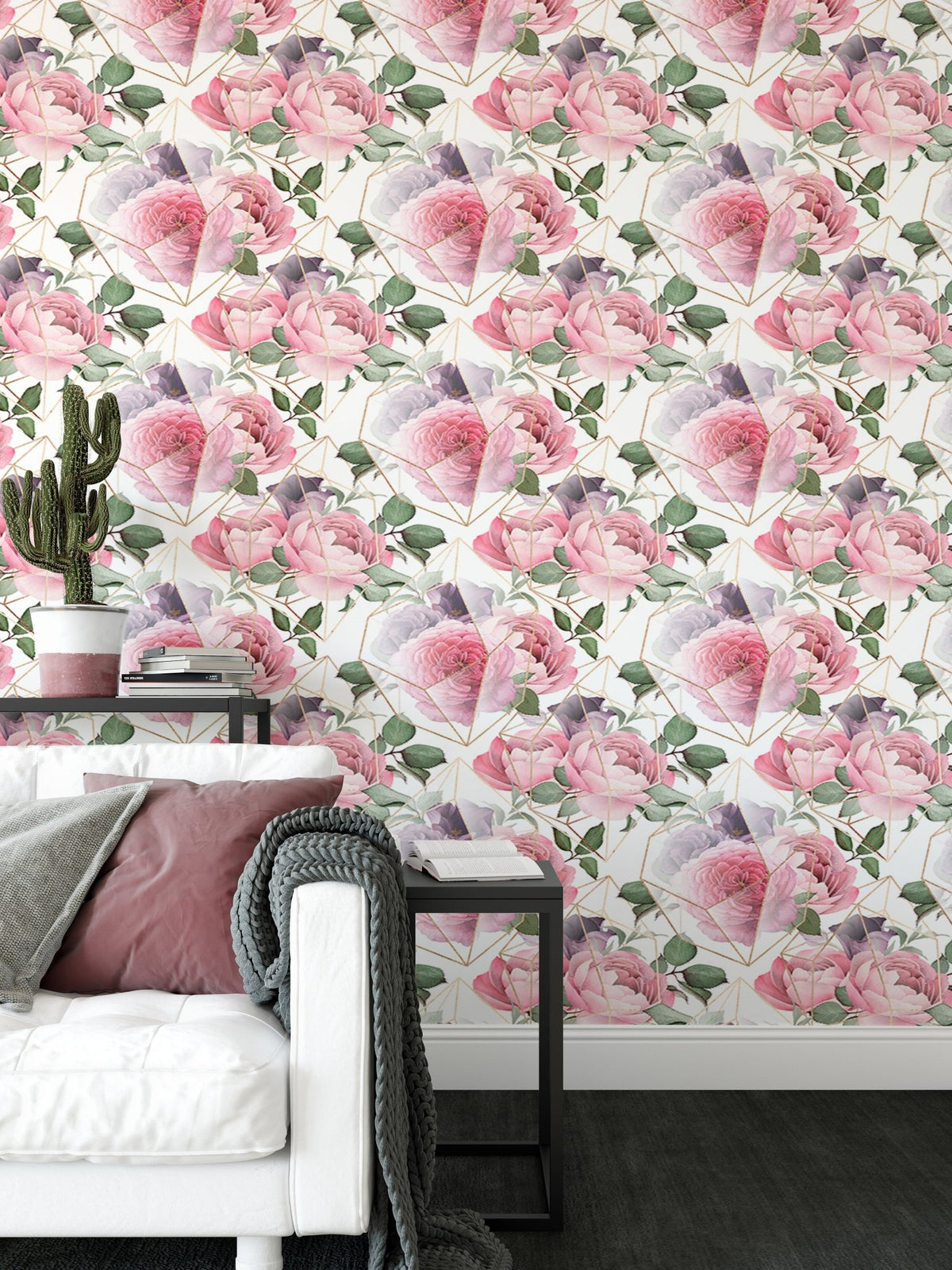 Modern living room wallpaper with pink flowers and a white sofa.