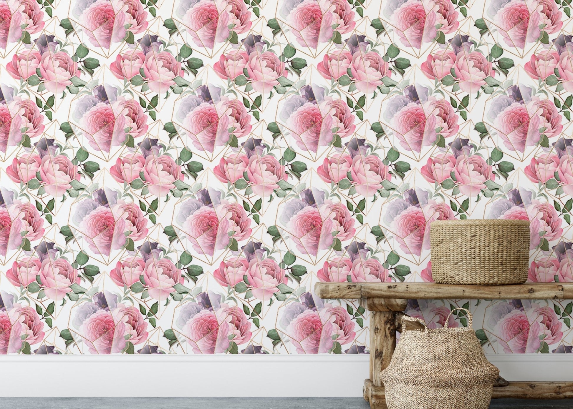 Pink and white watercolor flower wallpaper with woven baskets on a bench.