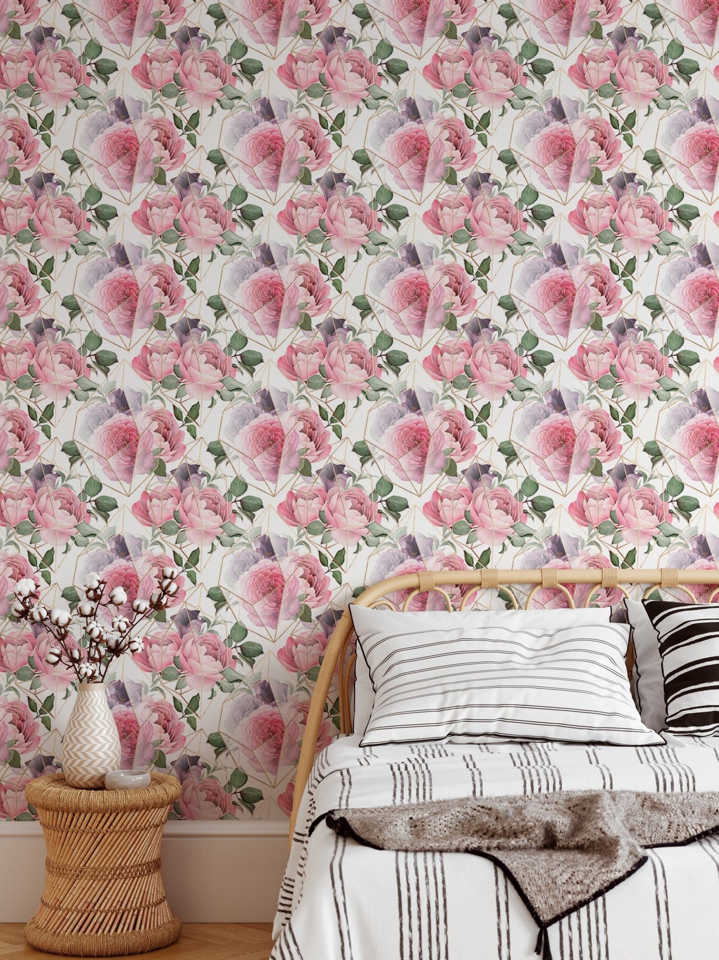 Bedroom wallpaper with pink rose patterns and white bedding.
