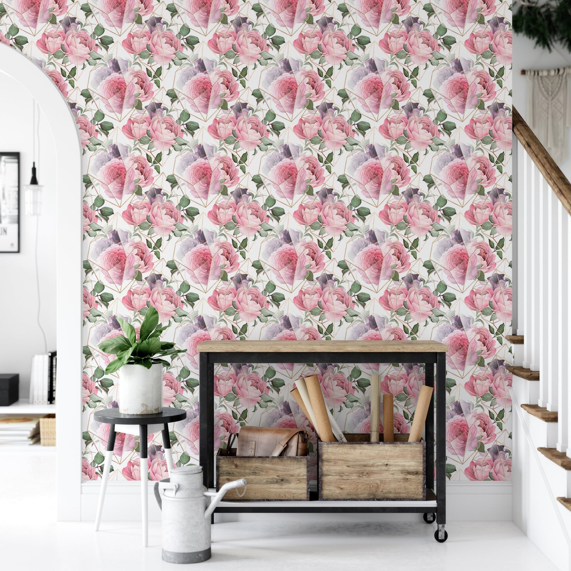 Entryway wallpaper with pink flowers and a black metal storage rack.