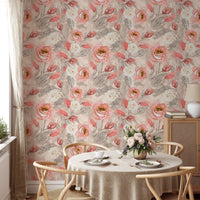 Pink rose wallpaper decorating a dining space with a round table and wooden chairs.