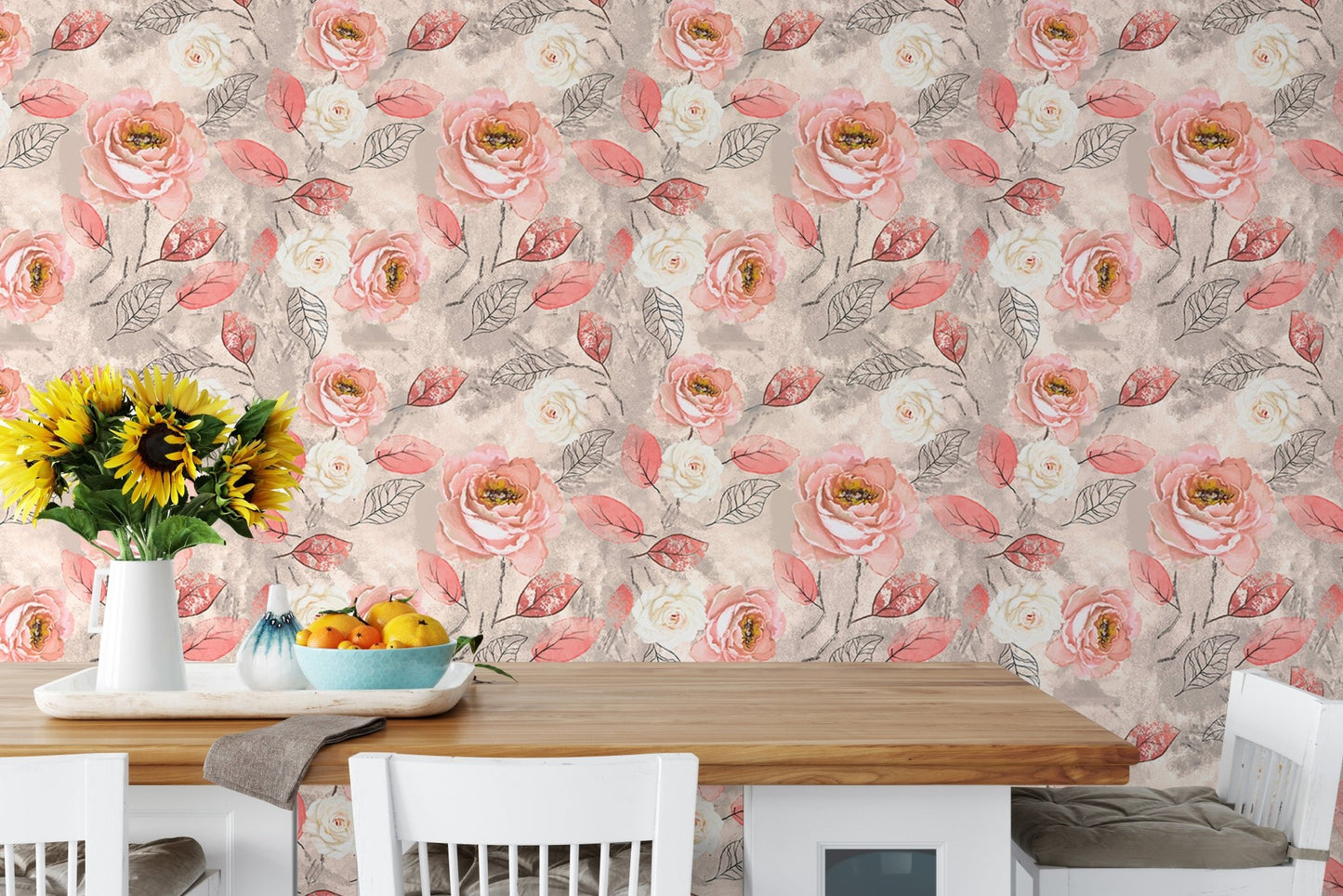 Floral wallpaper with pink roses behind a wooden dining table with yellow sunflowers.