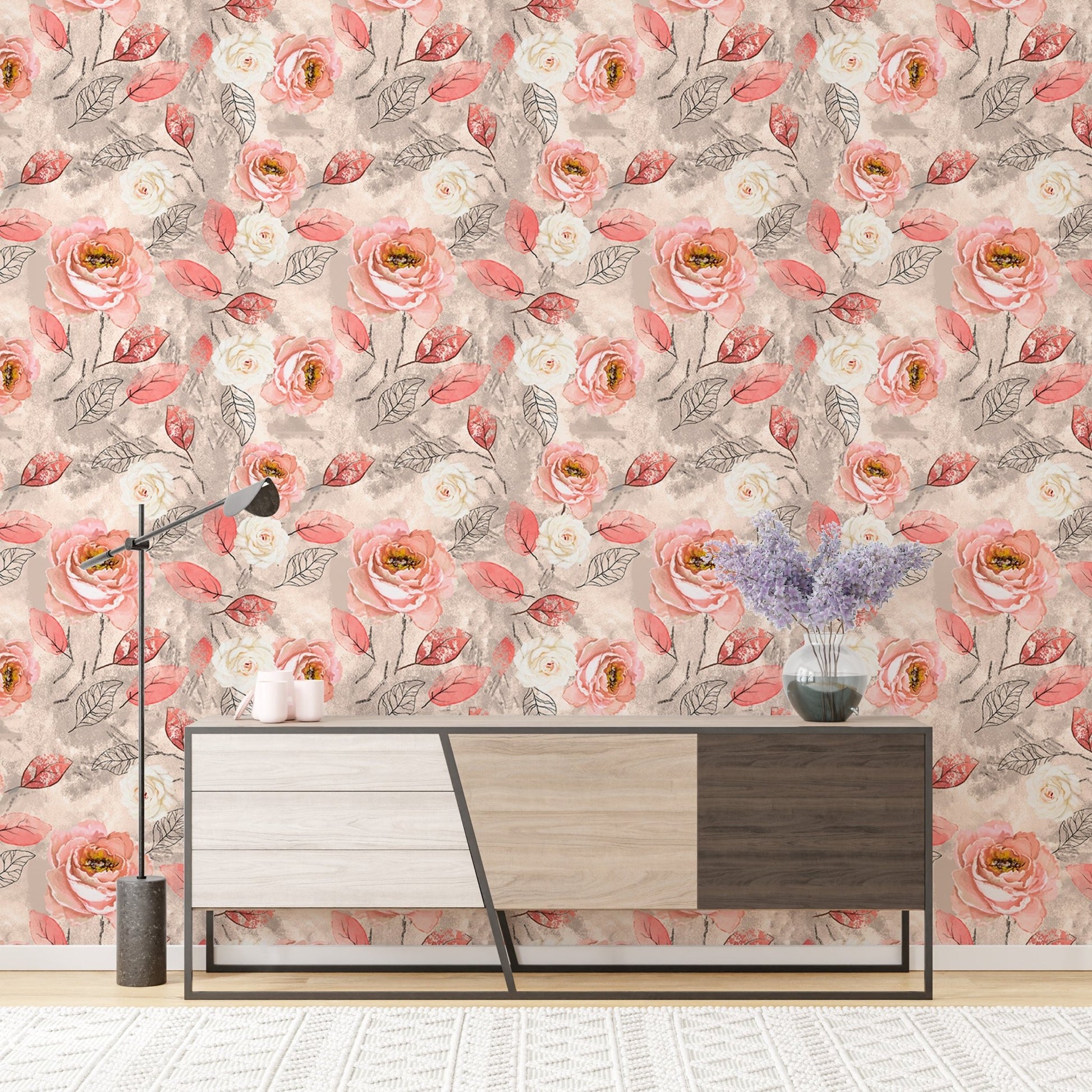 Flower wallpaper behind a contemporary sideboard with a lamp and vase.