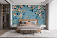 Master bedroom featuring a wooden bed frame and rose patterned wall mural.