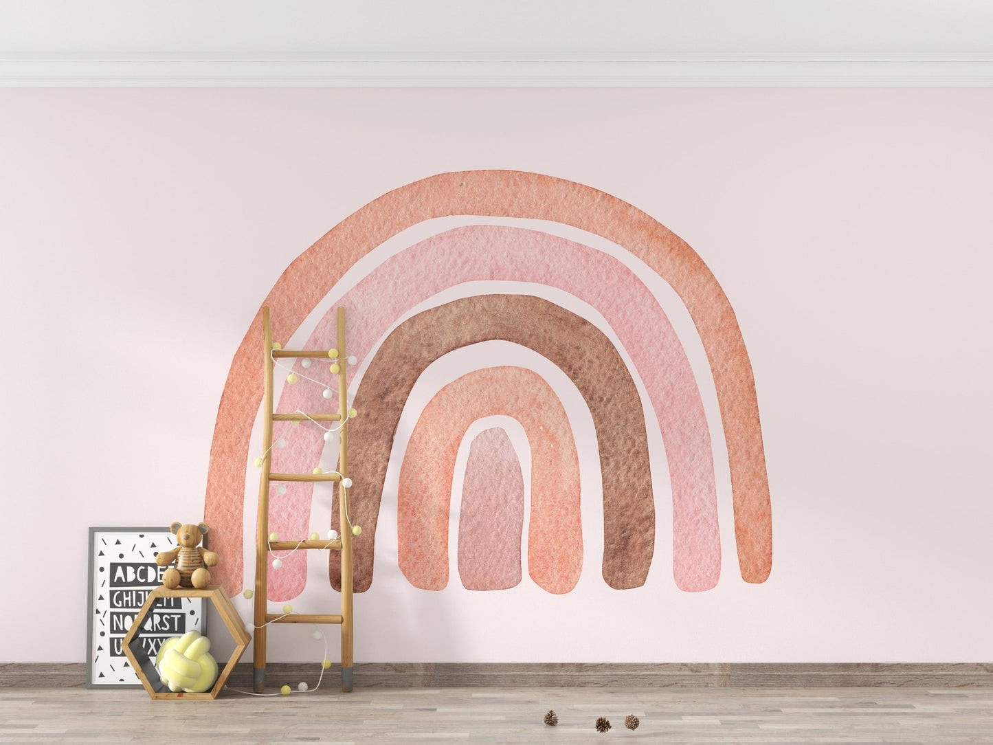 Bright rainbow watercolor wall mural in open kids room with wooden ladder.