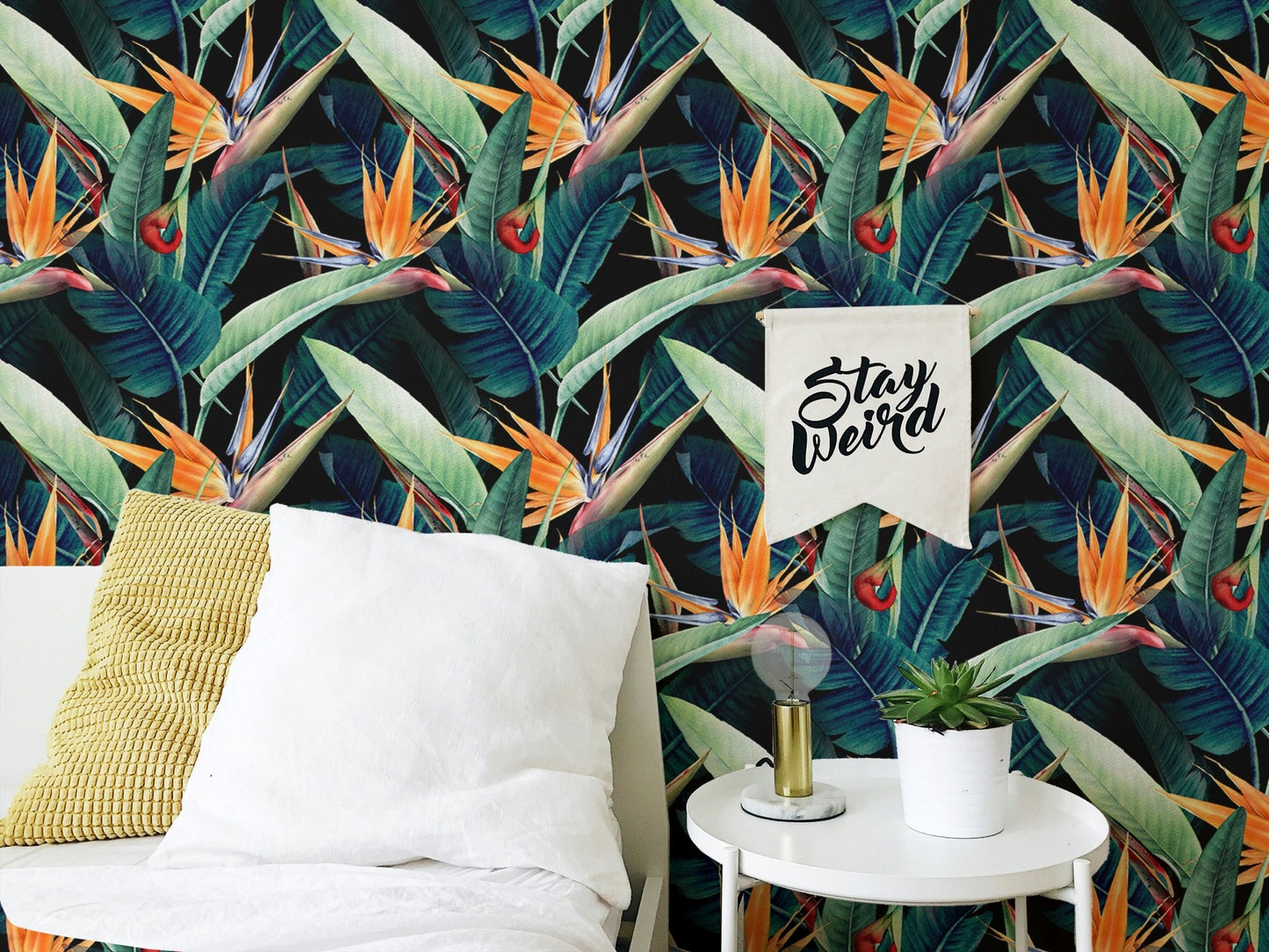 Watercolor Tropical Leaves Seamless Wallpaper in a neutral bedroom.