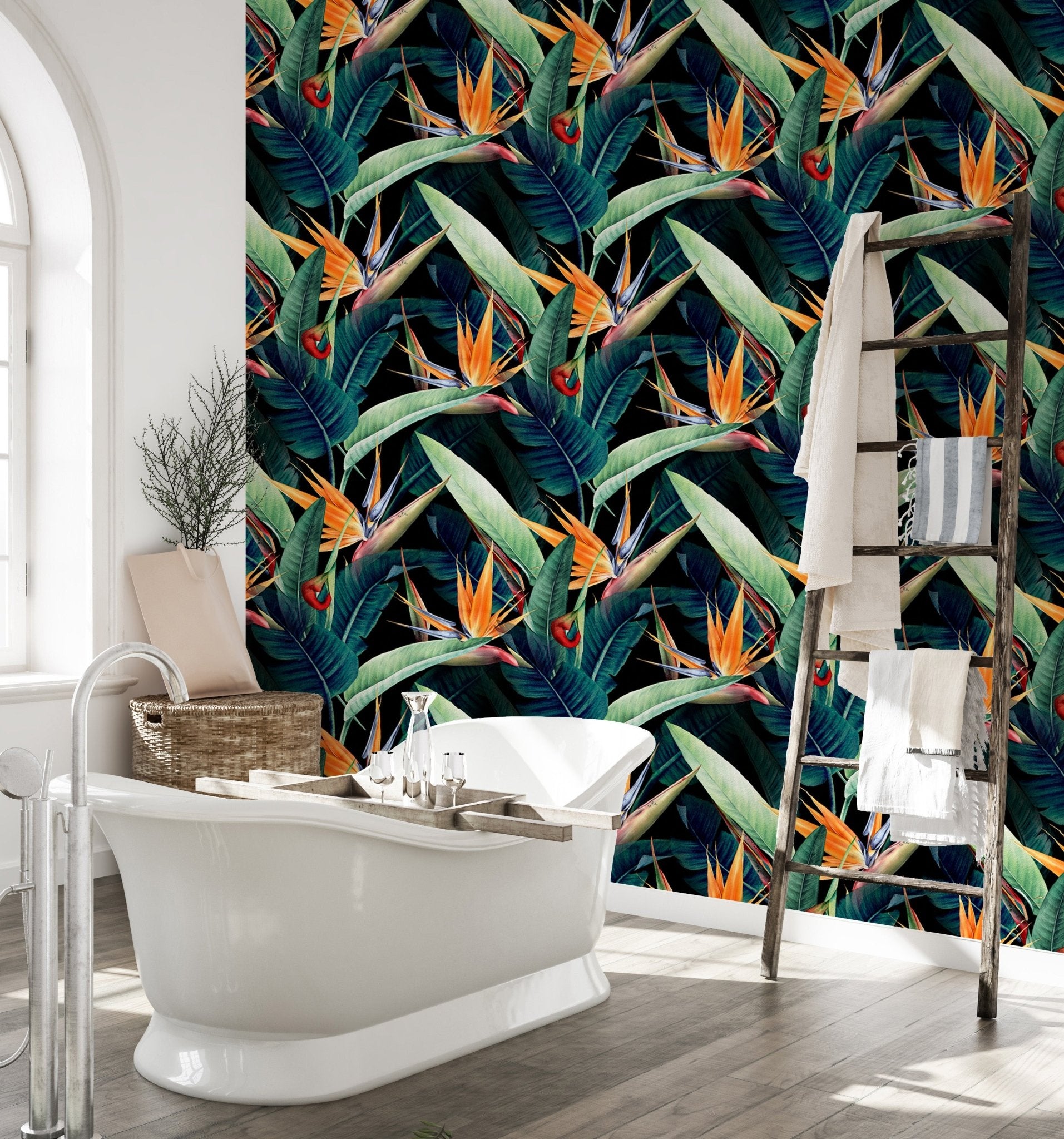 Dark tropical wallpaper mural applied to a bathroom accent wall.
