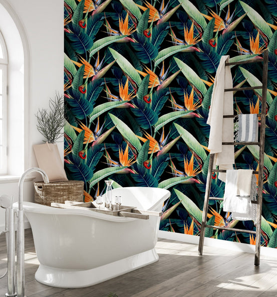 Dark tropical wallpaper mural applied to a bathroom accent wall.
