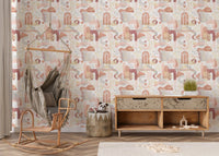 Nursery room setting with boho wallpaper and a hanging rattan chair.