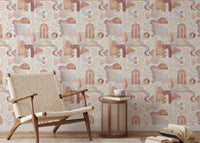 Scandi style chair in a room decorated with aesthetic boho wallpaper.