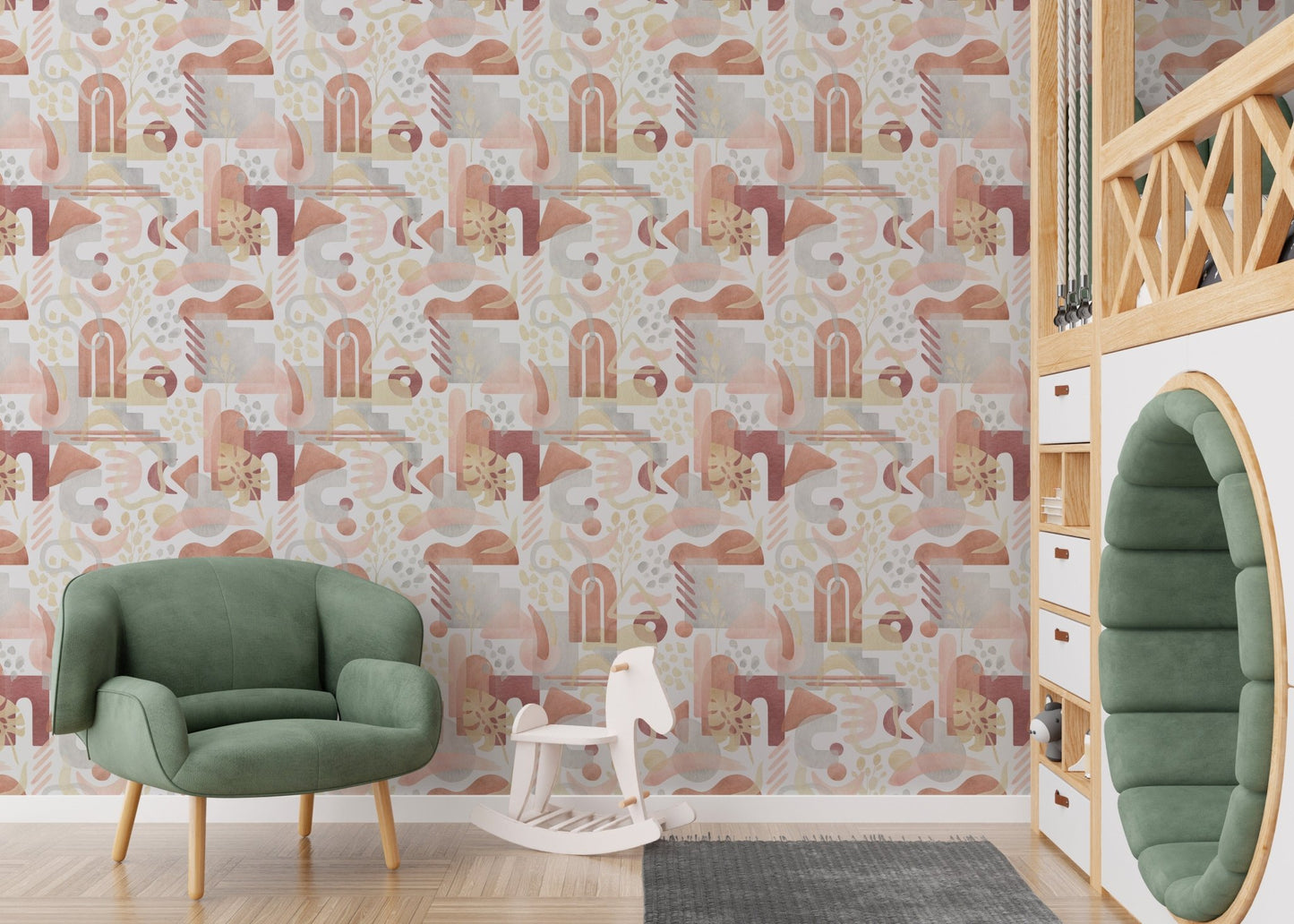 Kids playroom with green chair and watercolor warm pastel wallpaper.