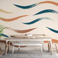 Dining area with a wooden table and a brushstroke wavy pattern wall mural.