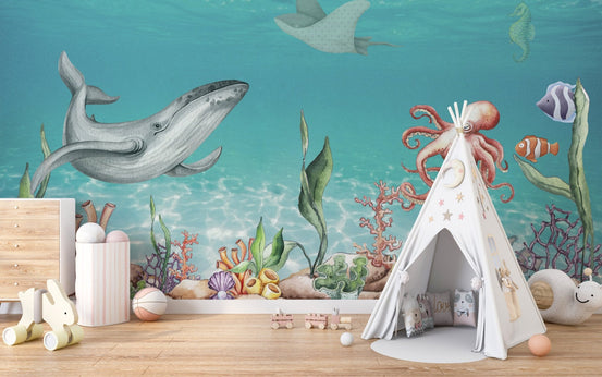 Whale and friends wallpaper mural with ocean animals in teal tones.