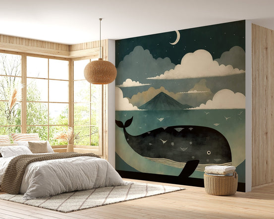 Whimsical night sky and a large whale in a nautical wallpaper mural.