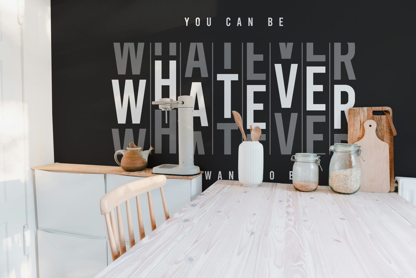Black background typography wallpaper mural with white statement text.