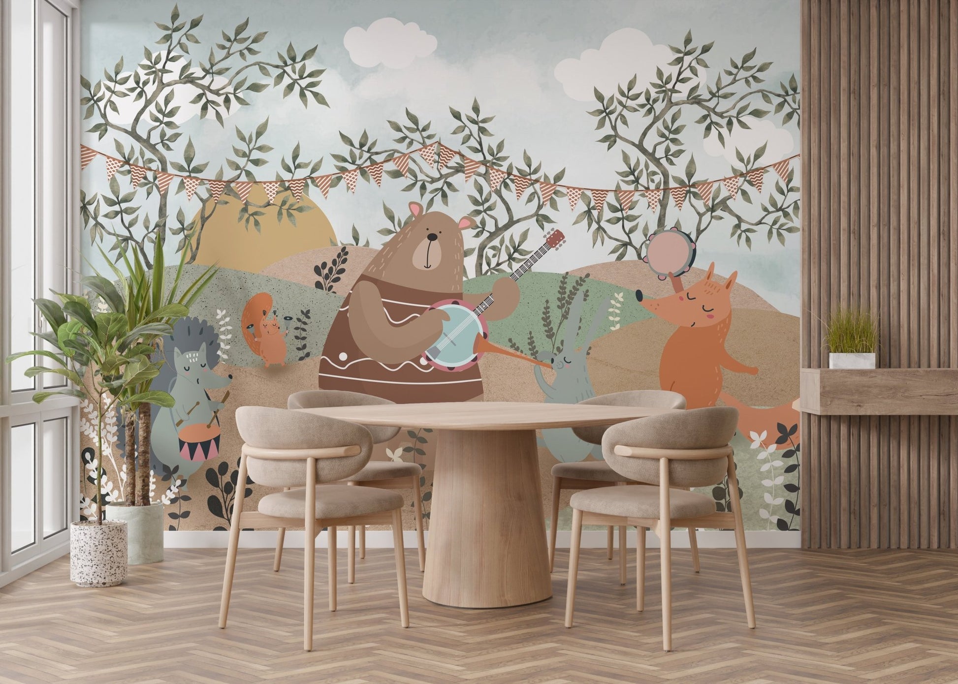 Forest themed wall mural with animals and bunting decor accents.