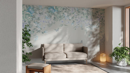 Pastel floral meadow wallpaper mural with soft blue petals and light foliage.