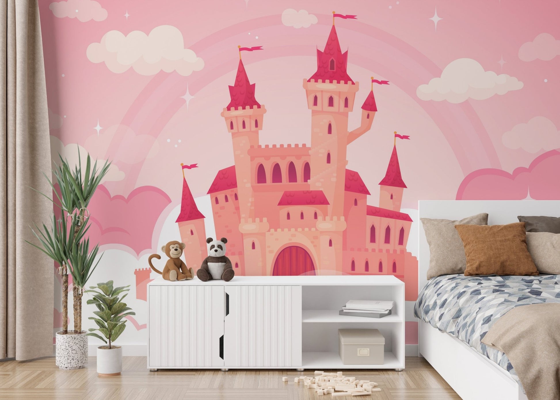 Pink castle wall mural in a child's bedroom with a white sideboard and bed.