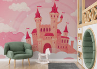Whimsical Cloud Castle Cartoon Murals in a playroom with a green velvet chair.