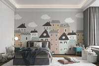 Cute nursery mural with colorful whimsical houses for kids bedroom.