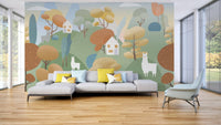 Living area wall mural with illustrated trees and small white cottages.