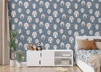 Whimsical Owls in Tree Repeat Pattern Wallpaper in a modern kids' bedroom with white bed.