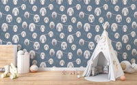 Blue and grey owl wallpaper for playrooms featuring a white fabric teepee tent.