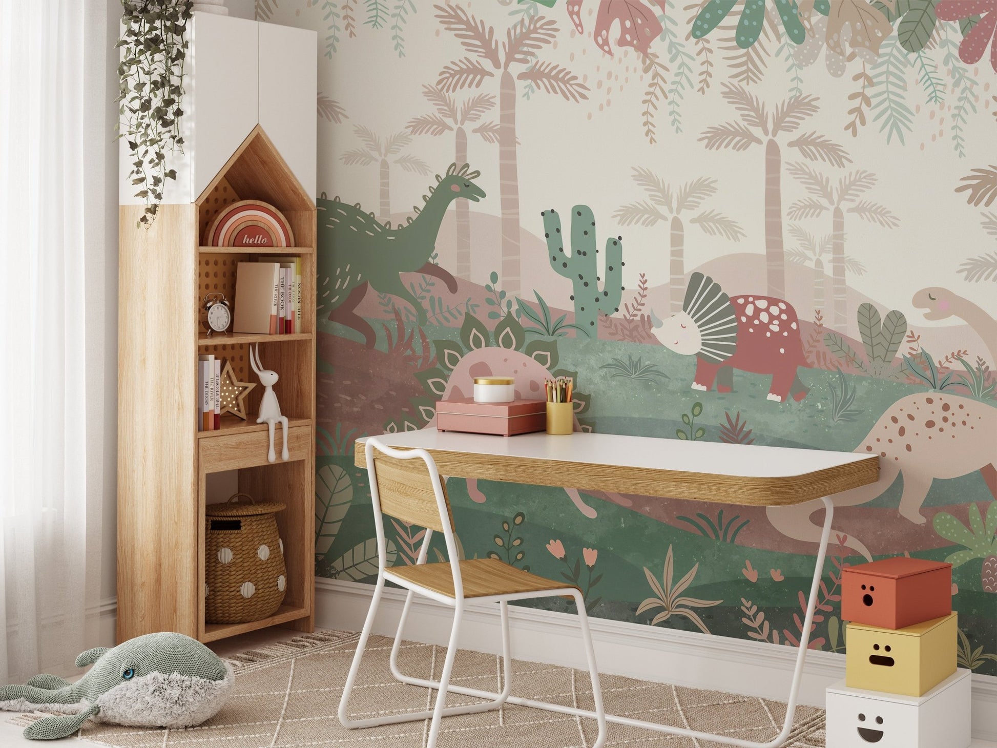 Study desk with a whimsical pastel dinosaur parade murals.