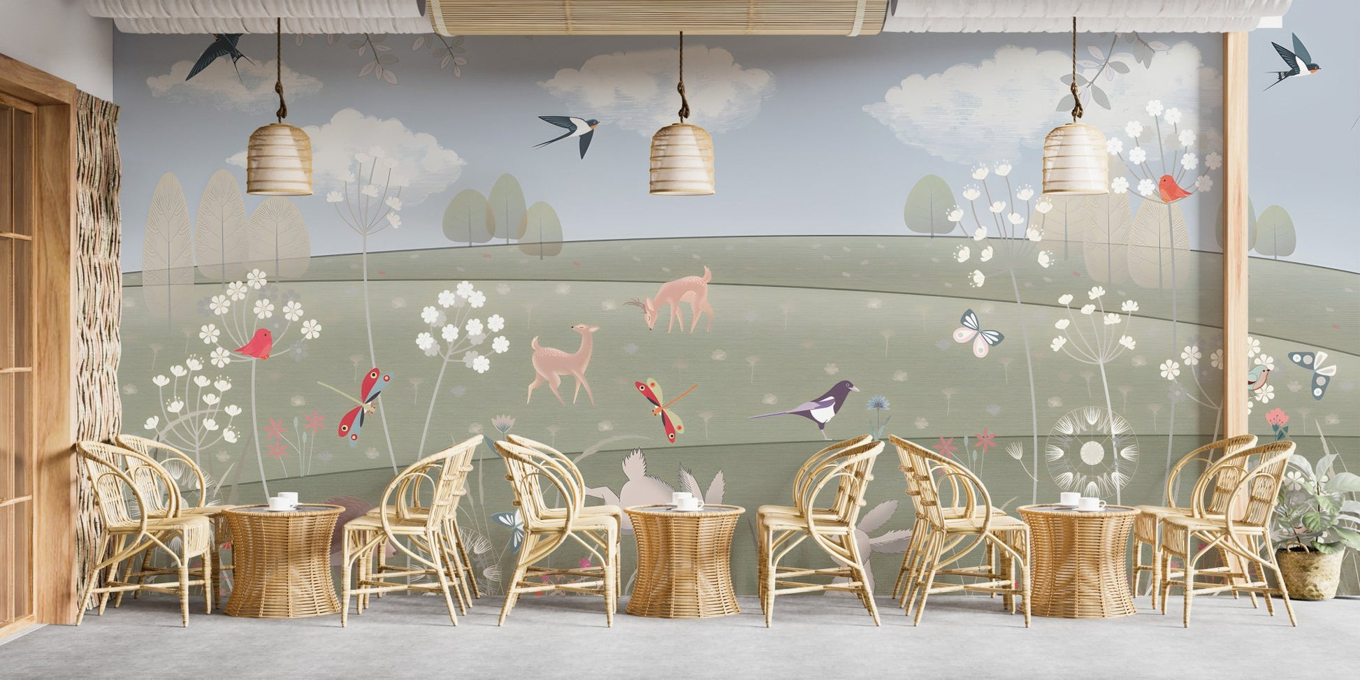 Storybook nature mural for lounge with birds, clouds and illustrated meadow plants.