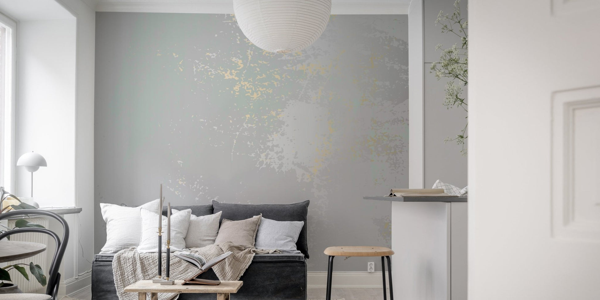 Pastel gray wall mural with soft whispering mist design in small sitting space.

