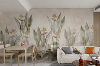 Open plan living area with neutral botanical paradise wall mural and dining table.