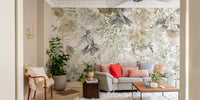 Modern living area featuring a whisper flower wall mural and green indoor plants.