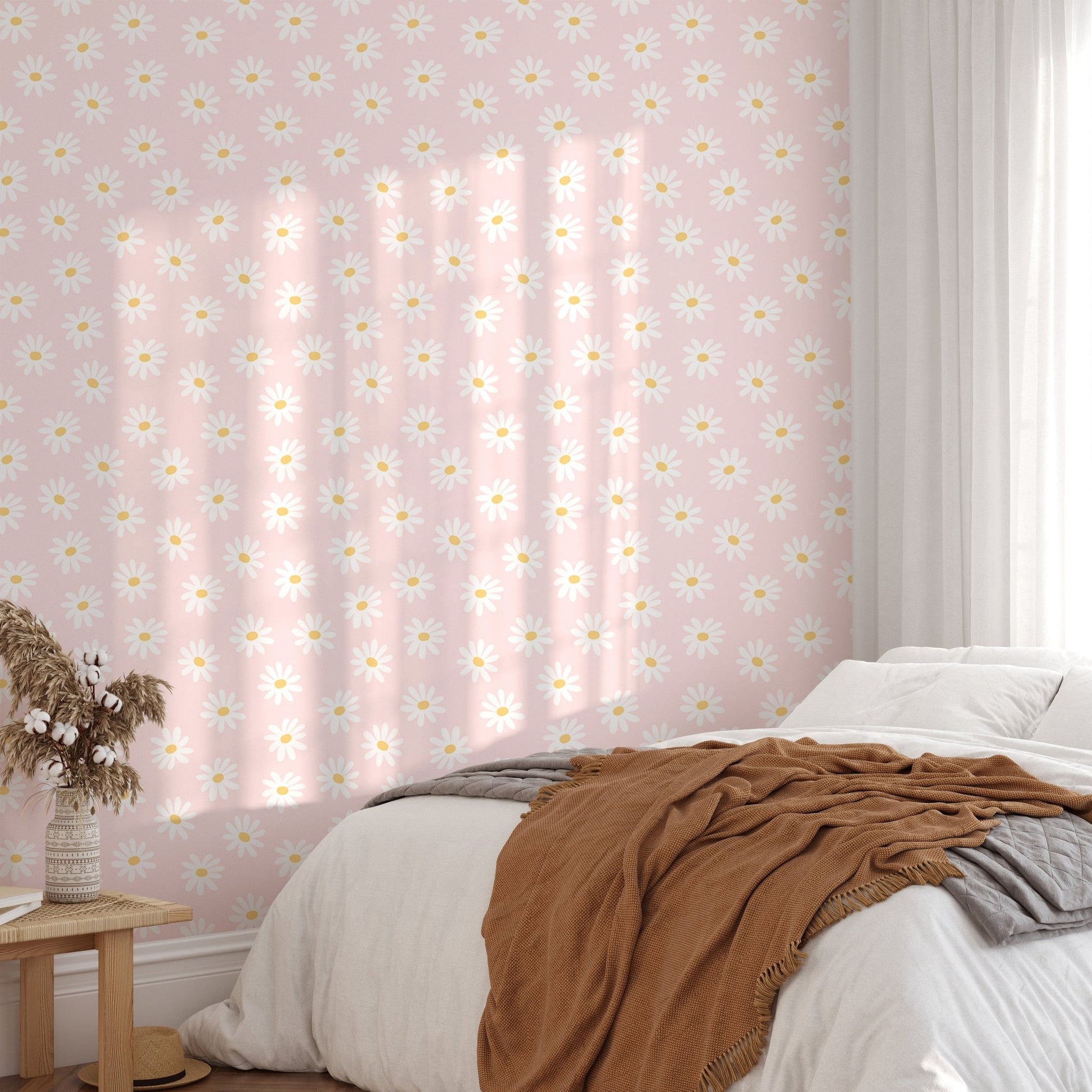 Sunlit bedroom showing the white cosmos flower pink background wallpaper.